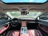 Hongqi H5 2024 cockpit view black dashboard red seats digita