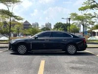 Hongqi H5 2024 black sedan full side profile on city road
